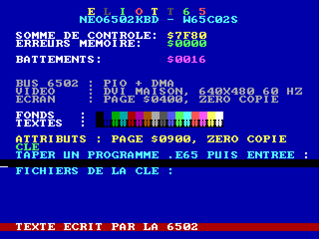 Eliott65 start-up screen in coloured text on a blue background: rainbow ELIOTT65 title, checksum $7F80, memory errors $0000, 16-colour palette